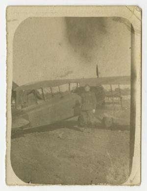 [Photograph of Henry Clay, Jr. by an Airplane]
