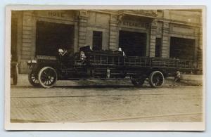 Primary view of object titled '[Postcard with a Photograph of a Service Truck]'.