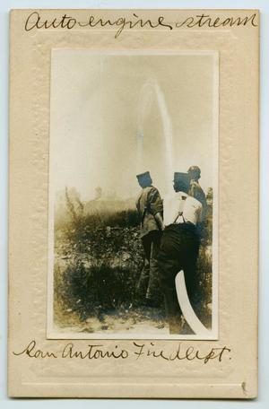 [Postcard with a Photograph of Three Firemen Working with a Hose]