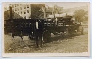 [Postcard with a Photo of a Man by a Service Truck]