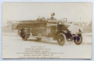 Primary view of object titled '[Postcard with a Photo of "The Mack"]'.