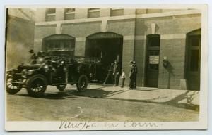 Primary view of object titled '[Truck Outside New Haven Fire Station]'.