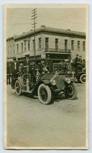 Primary view of object titled '[Photograph of a Car Belonging to a Fire Department]'.