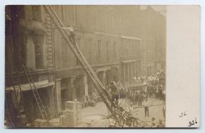 Primary view of object titled '[Postcard with a Photo of Firemen Going up a Ladder]'.