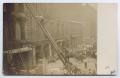 Postcard: [Postcard with a Photo of Firemen Going up a Ladder]