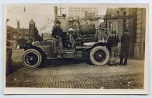Primary view of object titled '[Postcard with a Photograph of Firemen of the Houston Fire Department]'.