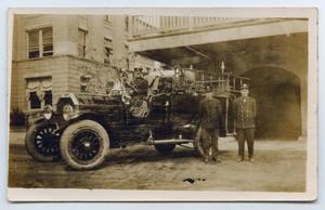 Primary view of object titled '[Early Austin Fire Truck and Firefighters]'.