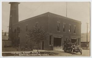 Primary view of object titled '[Postcard of an Old Fire Station in Iowa]'.