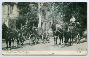 Primary view of object titled '[Photograph of Horse-Drawn Fire Engines, Victoria, Texas]'.