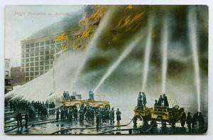 [Postcard of Fire Fighters Extinguishing a Large Fire]