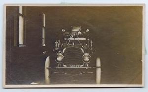 Primary view of object titled '[Photograph of a Fire Truck in a Garage]'.