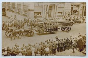 Primary view of object titled '[Postcard with a Photograph of Firemen in a Parade]'.