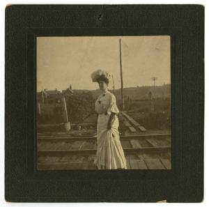 [Photograph of Ouida Caldwell Watts near Railroad Tracks]