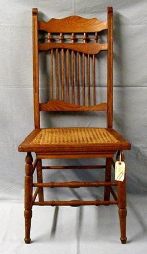[Stick and ball armless oak chair, higher angle shot]