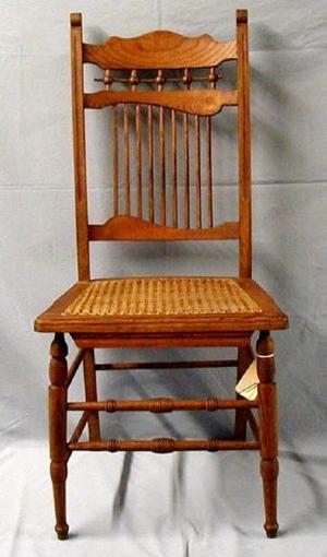 [Stick and ball armless oak chair, front angle]