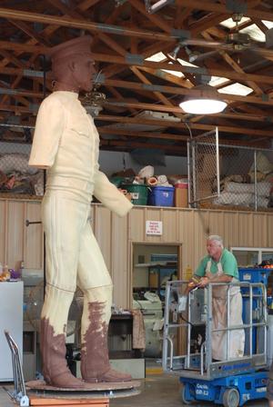 [Man Working on a Sculpture #2]