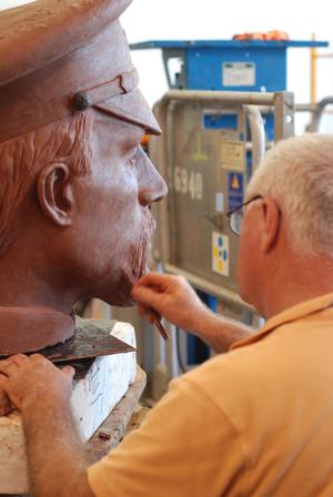 [Carving a Sculpture's Head]