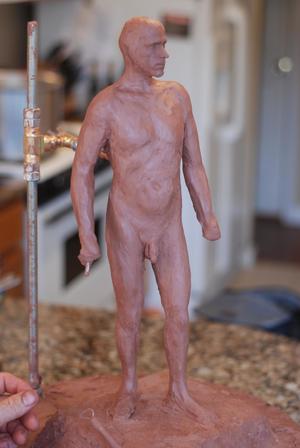 [Mini Sculpture of a Man]