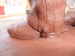 [Boots of a Statue]