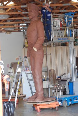 [Man Working on a Sculpture #7]