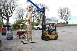 [Working on a Statue Hooked to a Forklift #3]