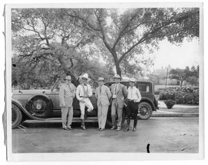 [Tom Mix with group of men]