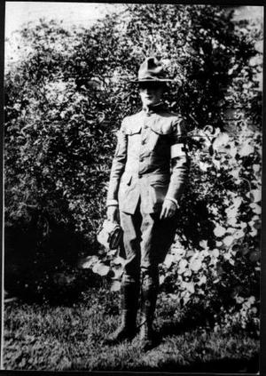[Photograph of a man in military]