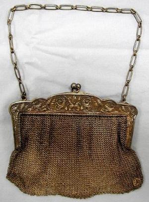 [Wire mesh handbag with a chainlink strap]