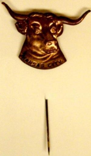 [Bronze pin of a head of a longhorn]