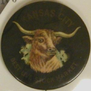 Primary view of object titled '[Dark button with image of a longhorn in center]'.