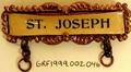 Physical Object: [Pin that states: "ST. JOSEPH"]