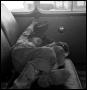 Primary view of [Young Boy Sleeping in a Car]