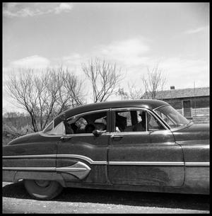Primary view of object titled '[Children Waving from a Car]'.