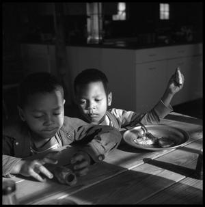 [Two of Oliver Jacobs' Grandchildren at a Table]