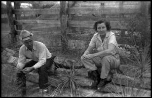 Primary view of object titled '[Ranchers Sitting Before a Fence]'.