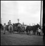 Photograph: [Men with a Mule Drawn Wagon]