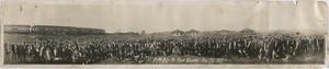 [Photograph of a Large Group of People by a Train]