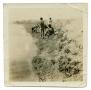 Photograph: [Photograph of People on the Bank of the River]