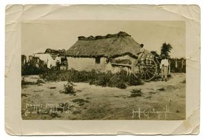 Primary view of object titled '[Photograph of People by a House]'.