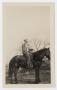 Photograph: [Photograph of a Man Riding a Horse]