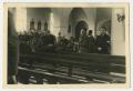 Photograph: [Photograph of Civilian Men and Soldiers Standing in a Church]