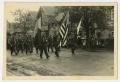 Photograph: [Photograph of Allied Troops Parading Down a Street]