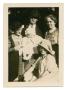 Primary view of [Photograph of Four Adults and a Small Child]