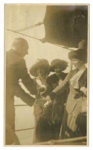 Primary view of object titled '[Photograph of Matilda Alice Sweeney Shaking Hands with a Man]'.
