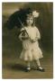 Postcard: [Postcard Showing Elmer Josephine Wheatly Holding an Umbrella]