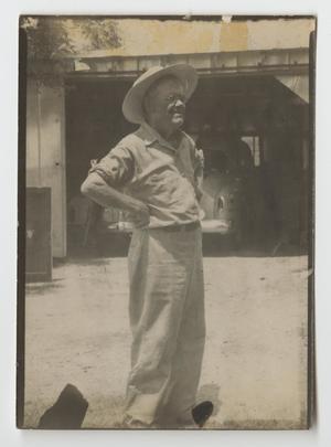 [Photograph of W. D. McCoy Outside a Garage]