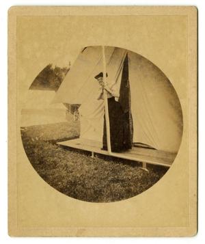 Primary view of object titled '[Photograph of Rebecca Ashton Brown by a Tent]'.