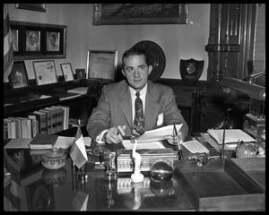 Governor Shivers sitting at his desk