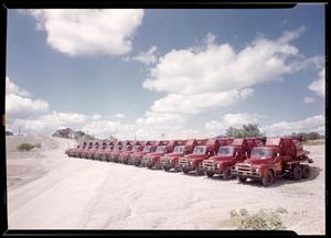 Transmix Cement Company's fleet of red trucks
