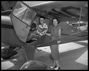 Man and Woman with Airplane